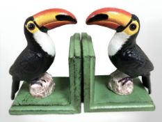 A pair of toucan metal bookends.