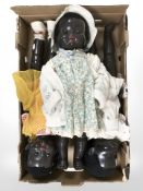 Three mid-20th century celluloid dolls.