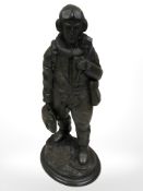 A bronze-effect statue of an RAF pilot, height 27 cm.