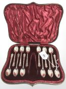 A set of twelve silver teaspoons, together with matching sugar tongs, Sheffield, 1901.