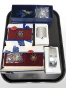 A group of Swarovski crystal ornaments including tulip display and other flowers.