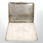 A silver cigarette case, Birmingham 1945. CONDITION REPORT: 179.4g.