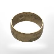 A 9ct yellow gold band ring, size V. CONDITION REPORT: 6.6g.