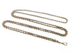 A Victorian silver muff chain, approximate length 150 cm. CONDITION REPORT: 55.9g.