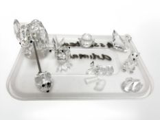 A small group of Swarovski crystal ornaments including elephant, birds, etc.