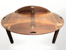 A mid 20th century mahogany tray table,