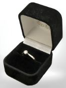An 18ct white gold diamond solitaire ring, size I, approximately 0.25ct.