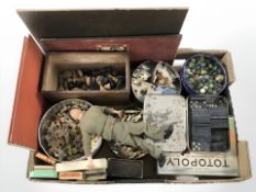 A box of vintage games and toys to include a tin of marbles, wooden box of chess and draught pieces,