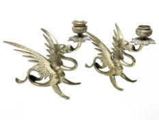 A pair of Gothic-style candlesticks, modelled as dragons, height 18 cm.
