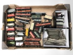 A quantity of Hornby Dublo tin plated rolling stock, track points, etc.