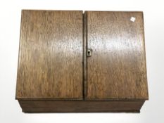 A Victorian oak correspondence box.