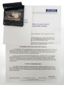 A Westminster issue 2003 24ct gold 1/10 oz Britannia, with certificate of authenticity.