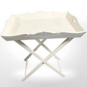 A painted white single drawer side table, width 55 cm, together with a white butlers tray on stand.