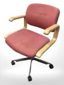 A 20th century swivel office chair, width 60 cm.