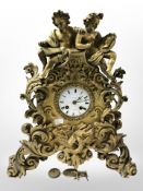 A late 19th century French gilt metal figural eight day mantel clock, height 41 cm.
