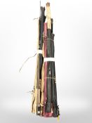 Two bundles of various fishing rods