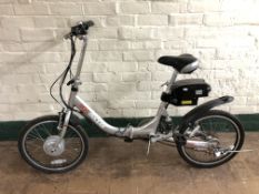 A Eco Stepper folding electric bike with key.