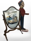 A mahogany shield shaped dressing table mirror and a dumbwaiter.