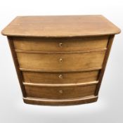 A continental mahogany bow-front four drawer chest,