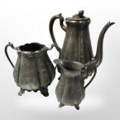 A Victorian pewter three piece tea service, height 24 cm.