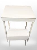 A painted vintage child's desk and a small similar cracket.