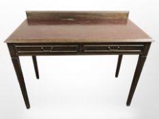 A mahogany two drawer side table by Thomas Justice & Sons, Dundee, 110 cm x 53 cm x 84 cm.