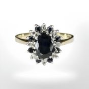 A 9ct gold sapphire and diamond cluster ring, size N CONDITION REPORT: 2.