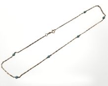 An antique 9ct gold turquoise bead necklace, length 39cm CONDITION REPORT: 3.