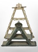 Two Scandinavian painted triangular wall shelves, tallest 80 cm.