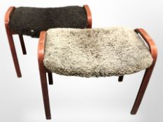 A pair of stained beech wood dressing table stools,