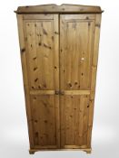 A pine double wardrobe, width 87 cm.