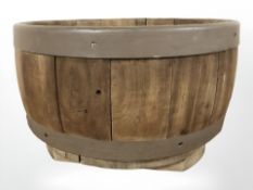 A barrel planter, width 40 cm.