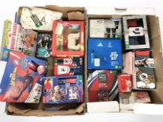 A quantity of cosmetic gift sets and socks (two boxes)