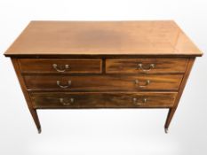 A late Victorian inlaid mahogany four drawer dressing chest, 114 cm x 50 cm x 79 cm.