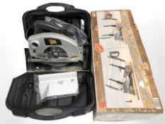 A JCB circular saw and a mitre stand.