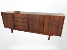A 20th century teak sideboard, 214 cm x 81 cm.