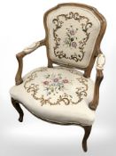 A continental walnut tapestry armchair,