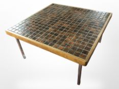 A 20th century tiled coffee table,