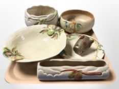 A group of Clarice Cliff for Newport and Wilkinson's Pottery bowls, and other ceramics.
