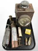 Two vintage fire extinguishers, miniature miners lamp, pocket balance scale, brass calendar,