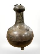 A 19th century Chinese bronze fly or wasp catcher, of typical mallet form, on three ball feet,