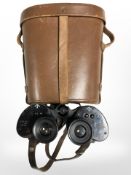 A pair of Canadian military issue binoculars in leather case