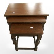 A nest of oak tables