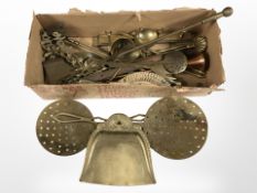 A group of brass chestnut roasting pans, other kitchenalia,