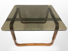 A 20th century smoked glass coffee table,