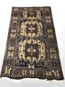 A Balouch rug, Afghanistan, 205 cm x 112 cm.