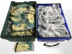 A large quantity of gardening gloves and protective eye goggles.