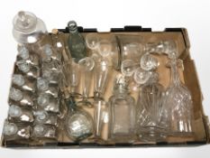 Assorted decanters, chemist's bottles, glass measures,
