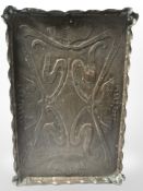 An Arts and Crafts embossed copper rectangular tray, 54 cm x 36 cm.