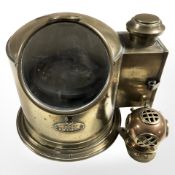 A Sestrel brass ship's binnacle and a miniature copper and brass diver's helmet